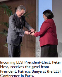 Incoming LESI President-Elect, Peter Hess, receives the gavel from President, Patricia Bunye at the LESI Conference in Paris.