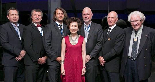 Yvonne Chua, Past-President LESI, center, with the LESANZ Presidents at their 40th Annual Meeting. From left, Tim Jones, Mark Horsburgh, Simon Rowell, Rob McInnes, Rodney Deboos, and Des Ryan (wearing his Gold Medal).
